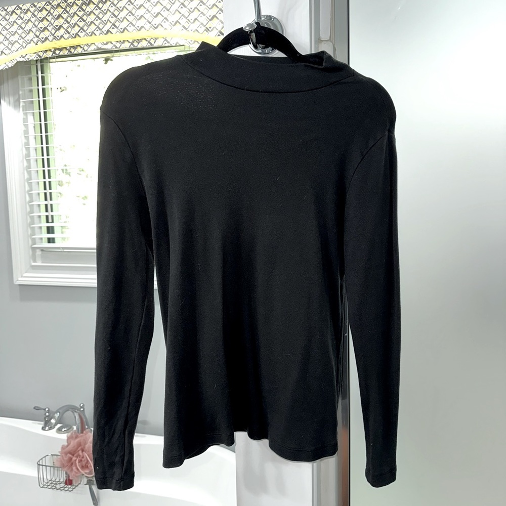 This is a wonderful half turtle neck to wear in the winter time.